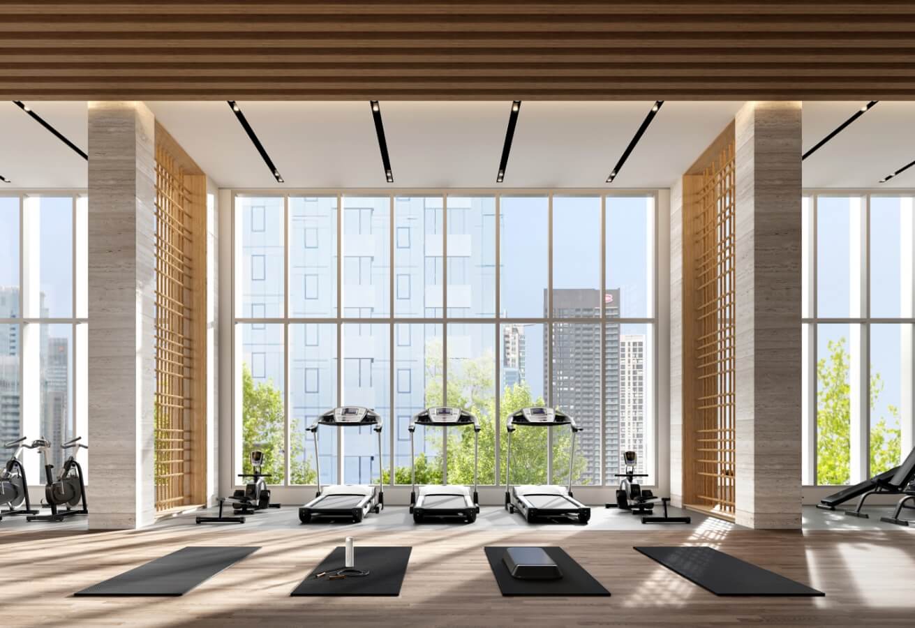 Interior view of the gym at a condo building for sale in downtown Montreal called Quinze-Cent